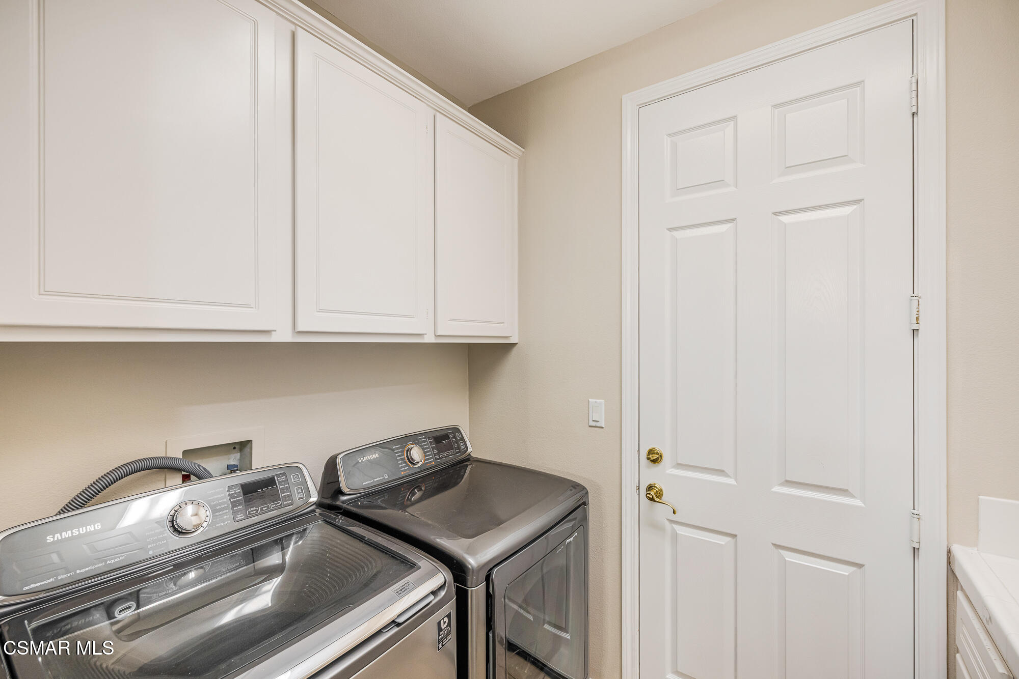 5353 Willow Oak Street Simi Valley, CA 93063 - Photo 17 of 52 a utility room with dryer and washer