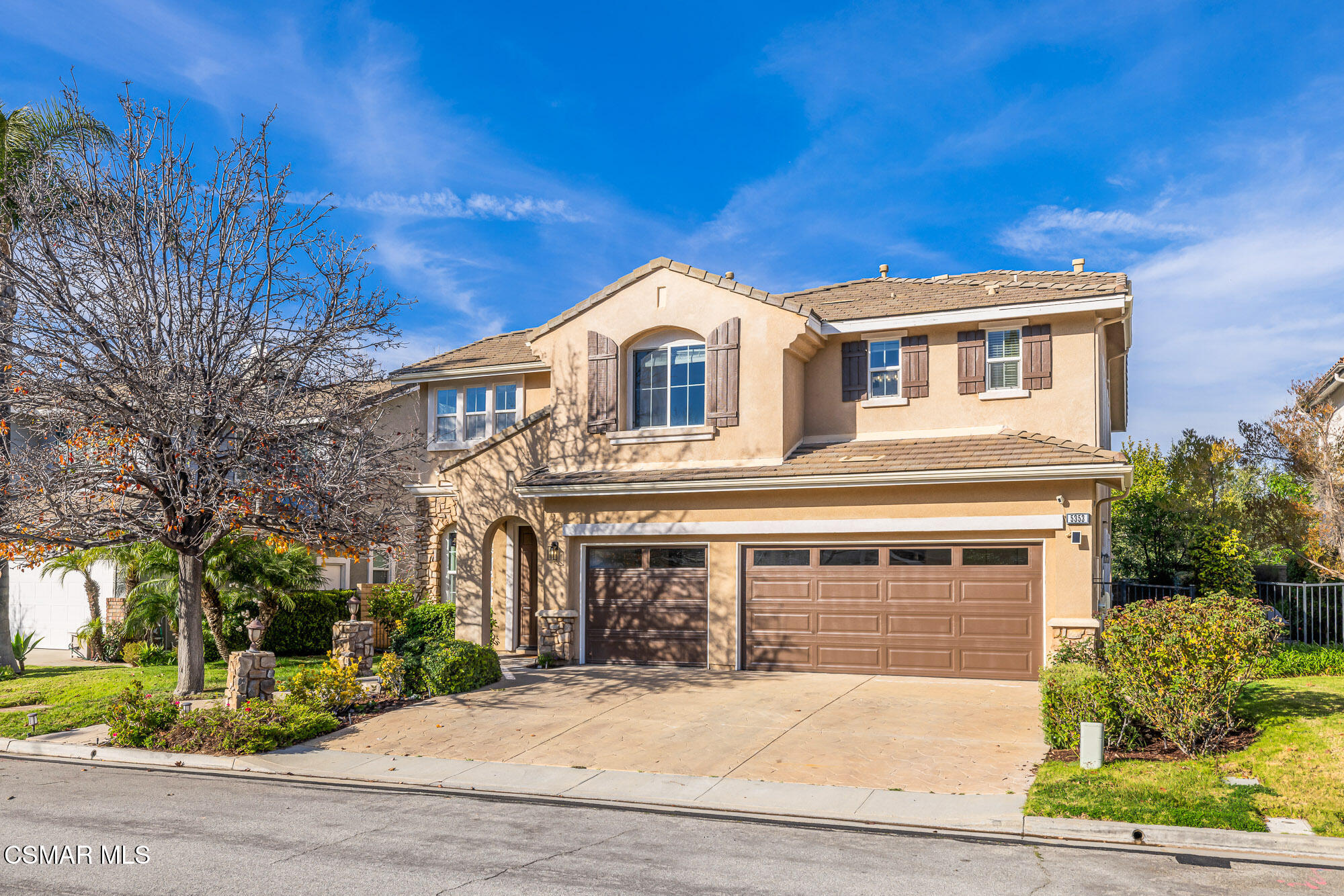 5353 Willow Oak Street Simi Valley, CA 93063 - Photo 2 of 52 a front view of a house with garden