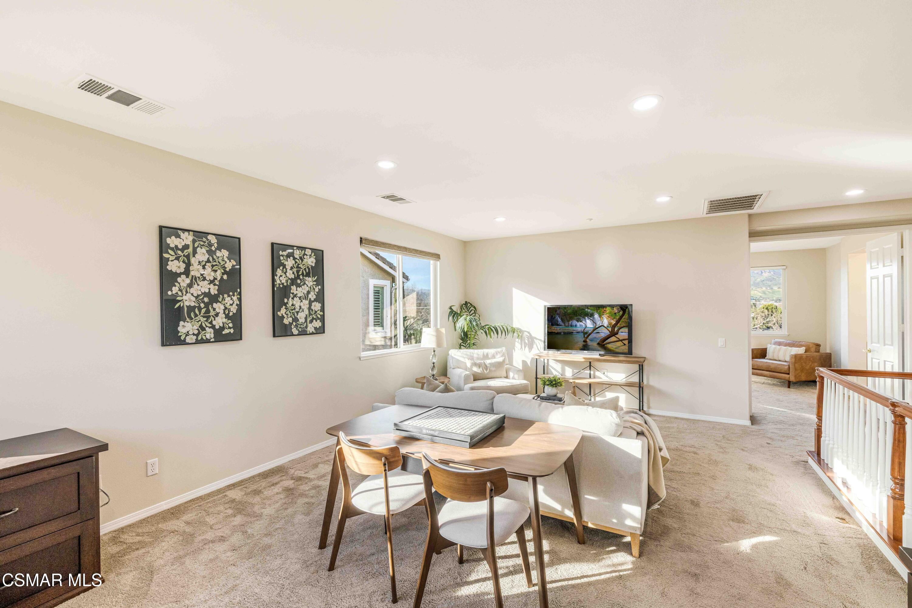 5353 Willow Oak Street Simi Valley, CA 93063 - Photo 21 of 52 a view of a dining room with furniture