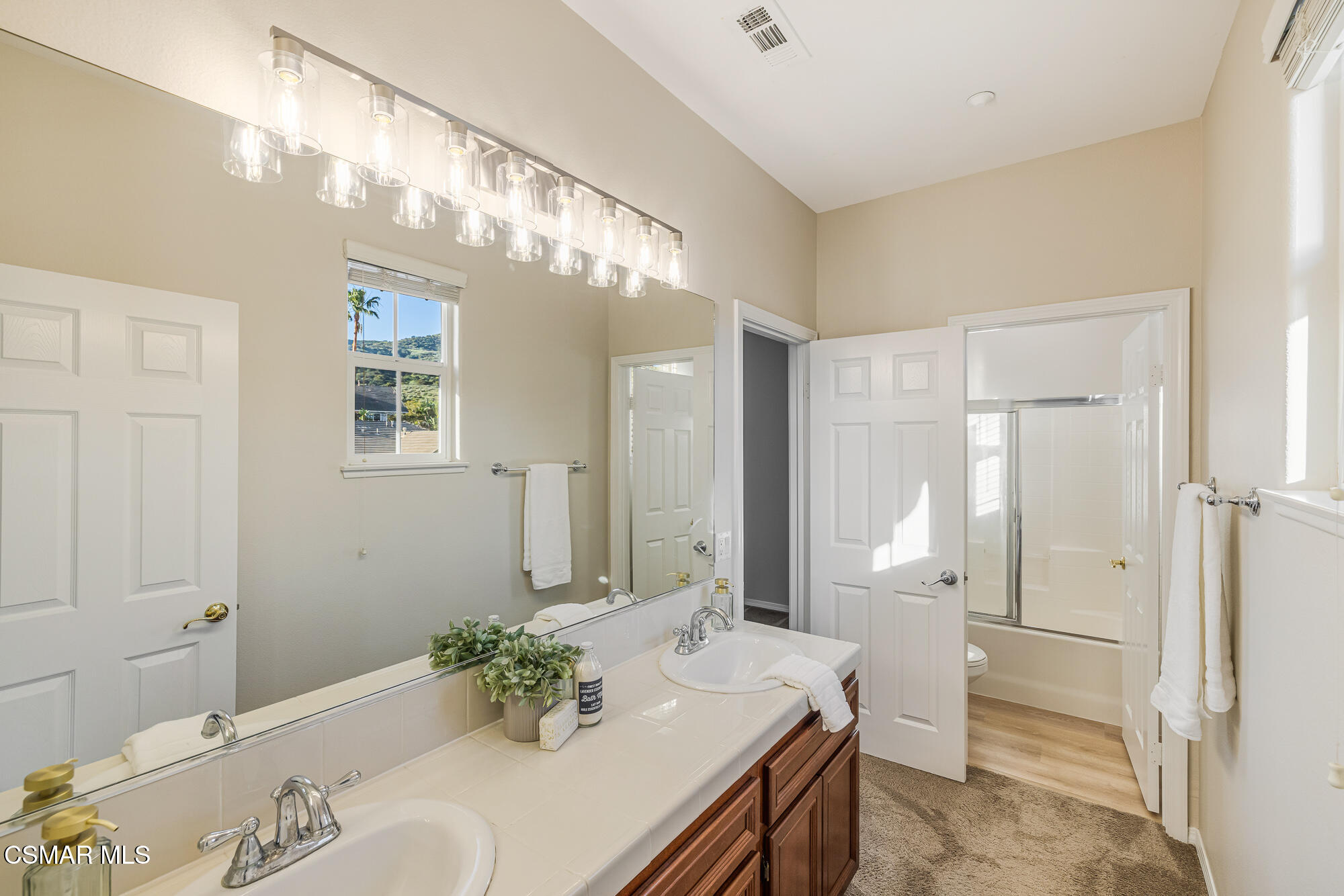 5353 Willow Oak Street Simi Valley, CA 93063 - Photo 28 of 52 a bathroom with a sink and shower