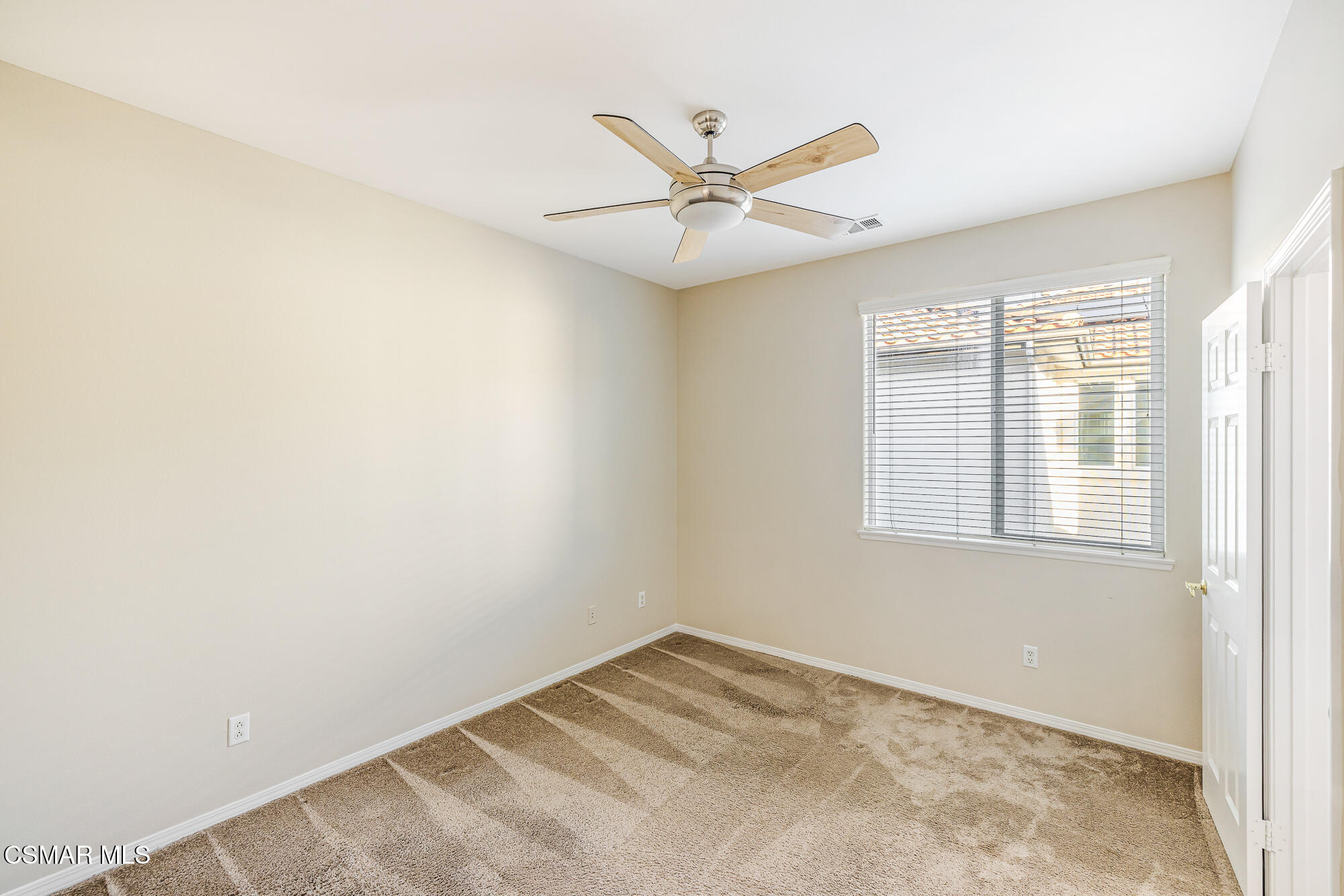 5353 Willow Oak Street Simi Valley, CA 93063 - Photo 32 of 52 an empty room with windows and fan