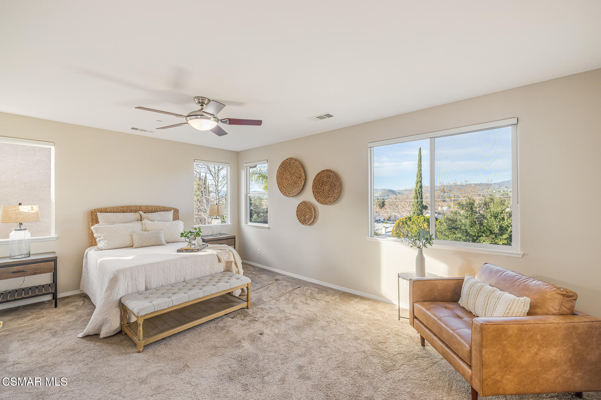 5353 Willow Oak Street Simi Valley, CA 93063 - Photo 34 of 52 a bedroom with a large bed couch and a window