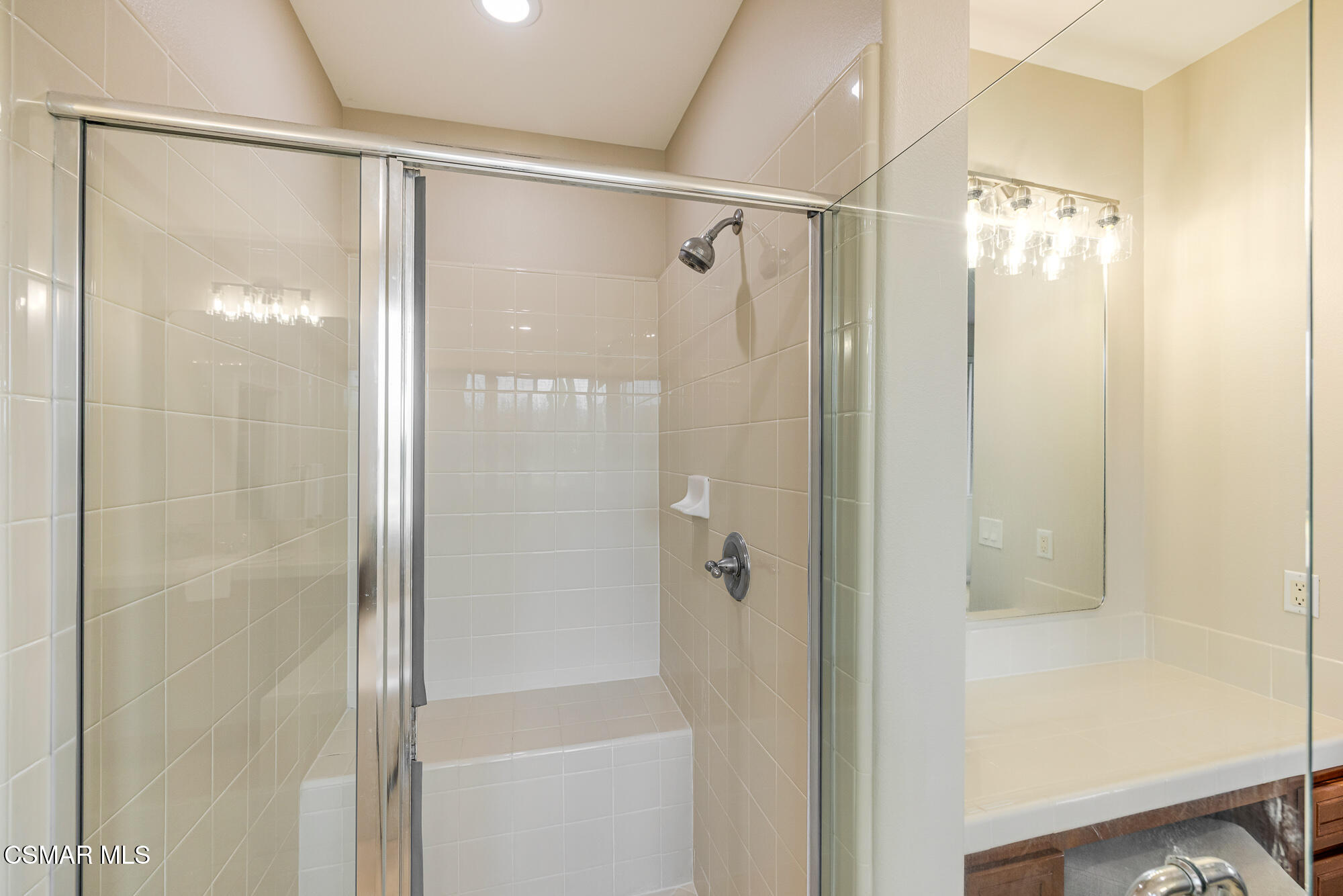5353 Willow Oak Street Simi Valley, CA 93063 - Photo 38 of 52 a bathroom with a glass shower door and mirror