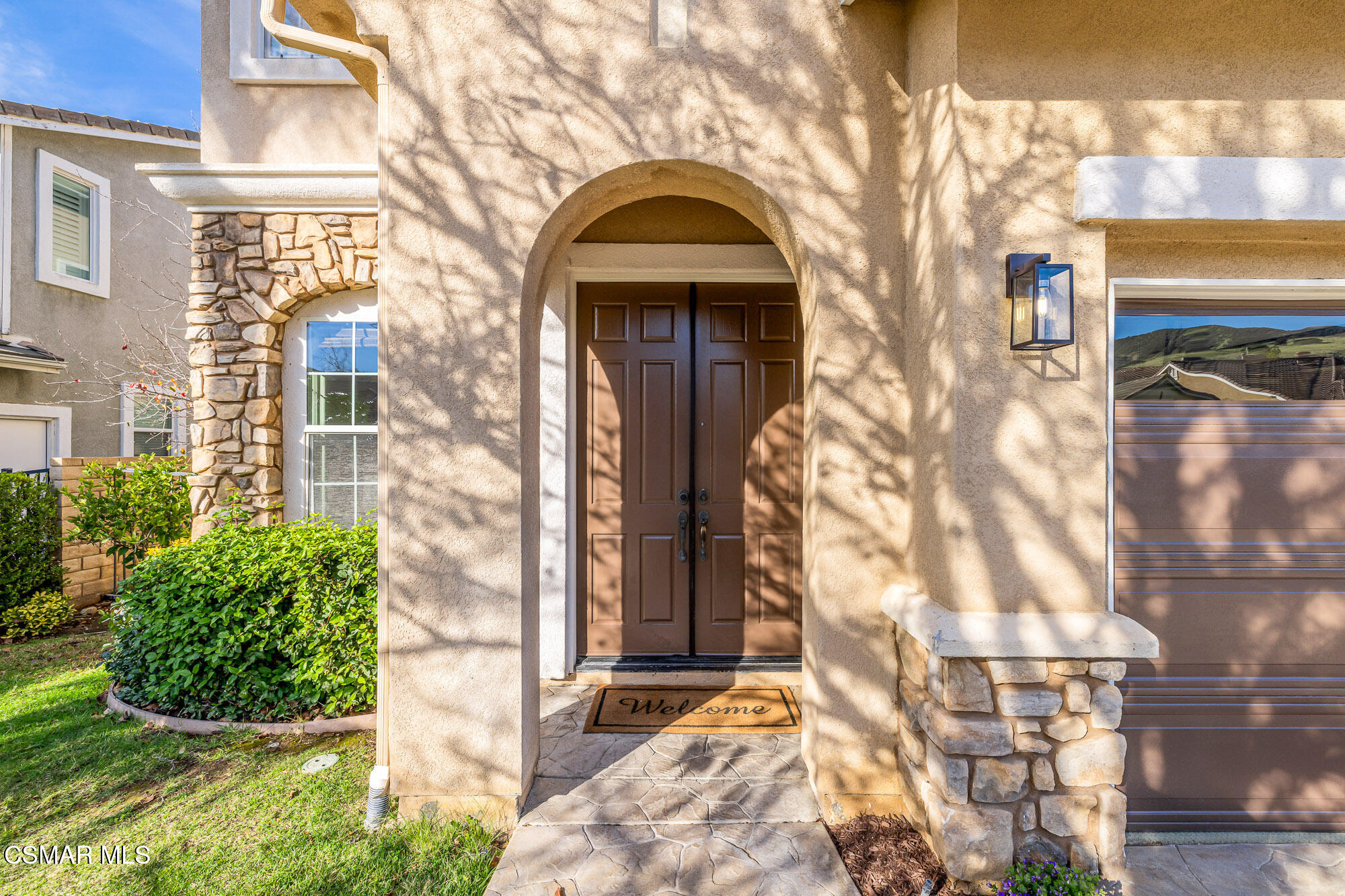 5353 Willow Oak Street Simi Valley, CA 93063 - Photo 4 of 52 a front view of a house with garden