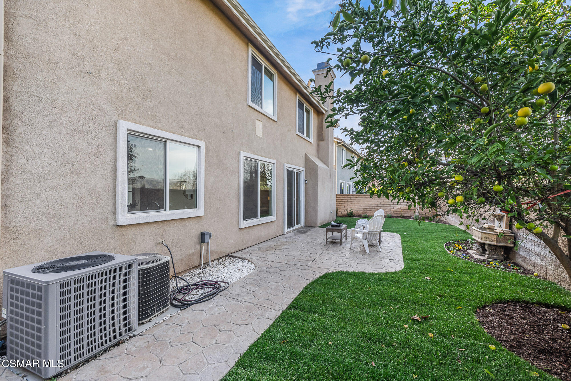 5353 Willow Oak Street Simi Valley, CA 93063 - Photo 42 of 52 a view of a patio with couches table and chairs and garden