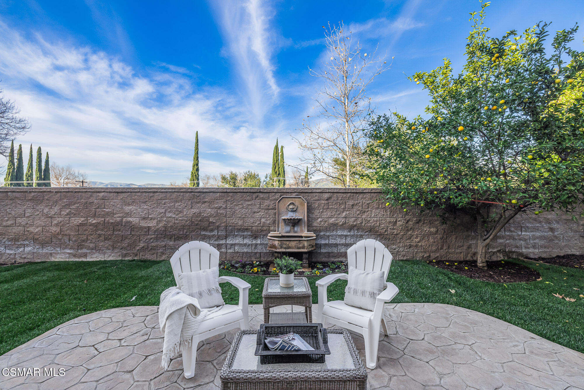 5353 Willow Oak Street Simi Valley, CA 93063 - Photo 45 of 52 a view of a chair and table in back yard of the house