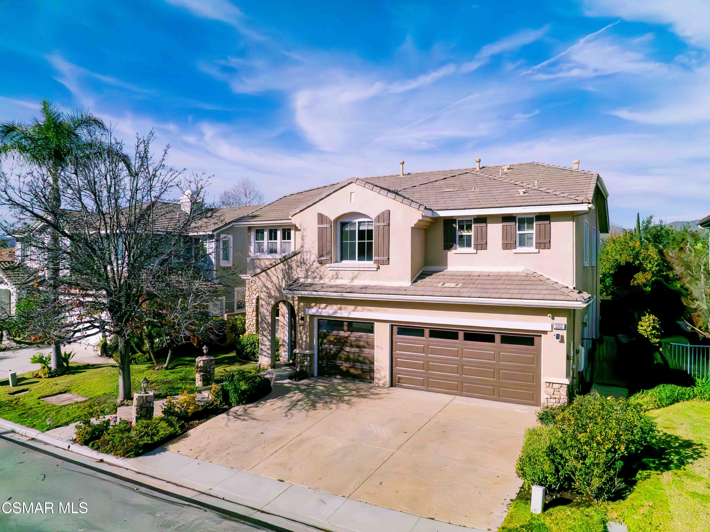 5353 Willow Oak Street Simi Valley, CA 93063 - Photo 48 of 52 a front view of a house with garden