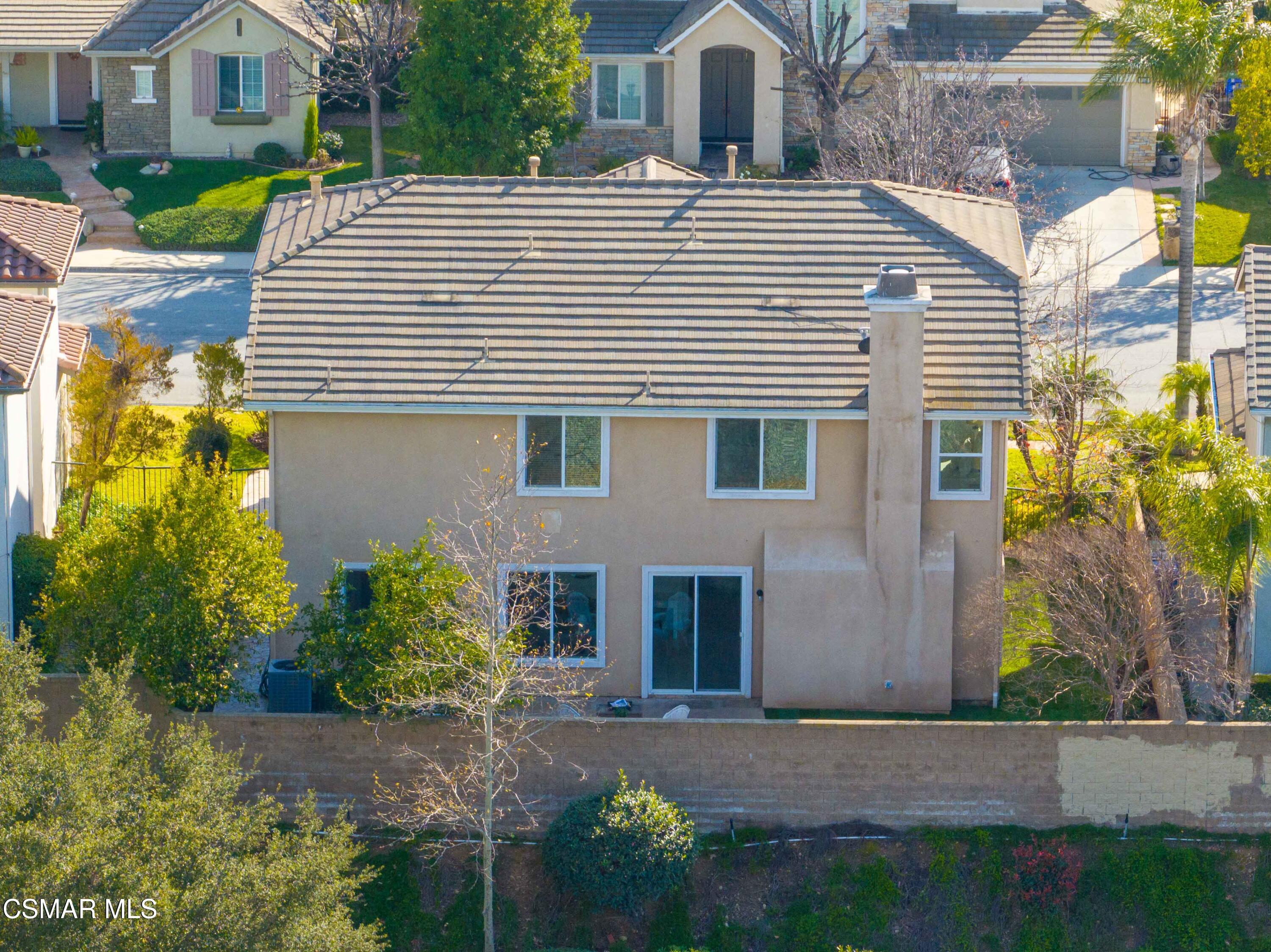 5353 Willow Oak Street Simi Valley, CA 93063 - Photo 49 of 52 a white building with a outdoor space