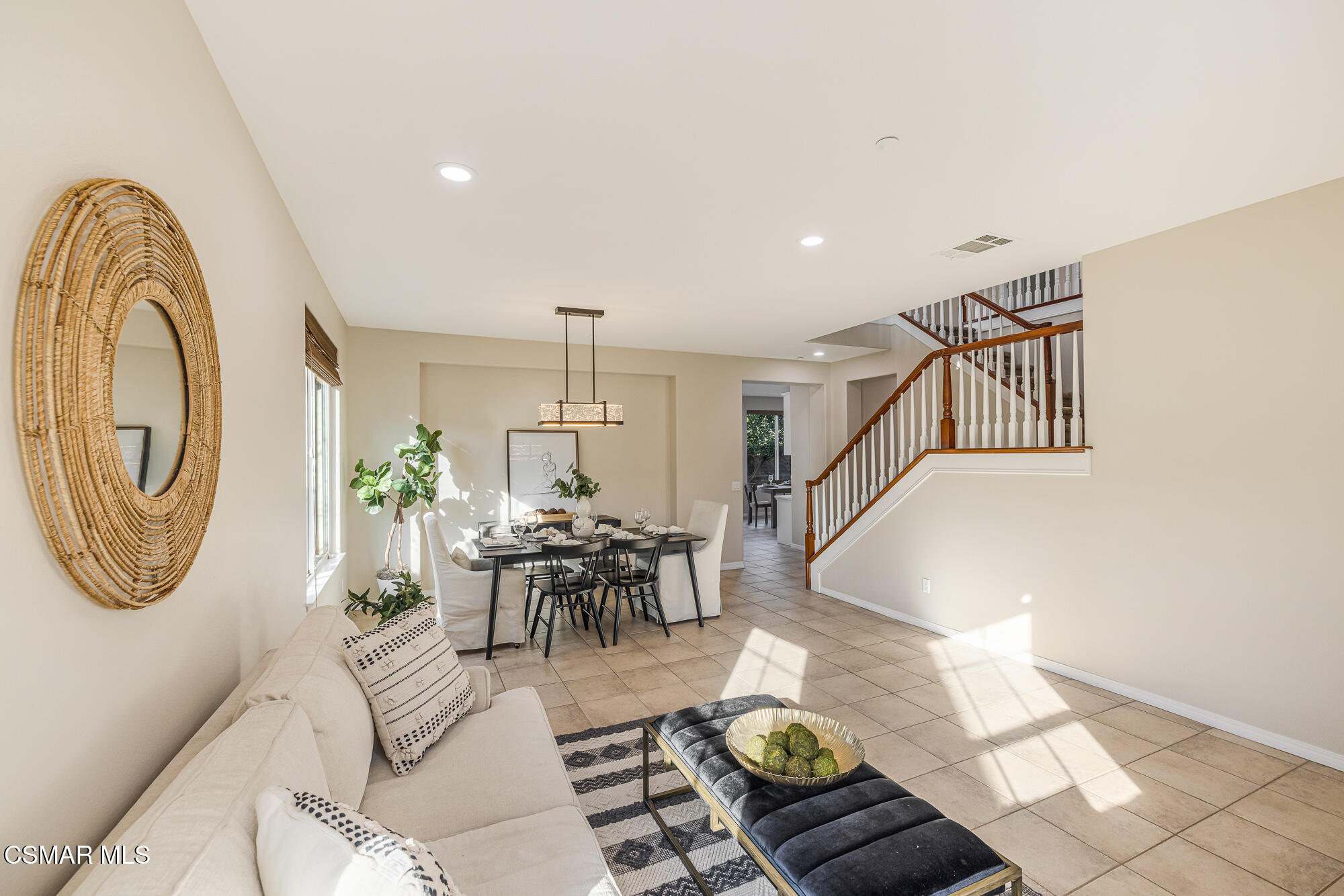 5353 Willow Oak Street Simi Valley, CA 93063 - Photo 7 of 52 a living room with furniture and a chandelier