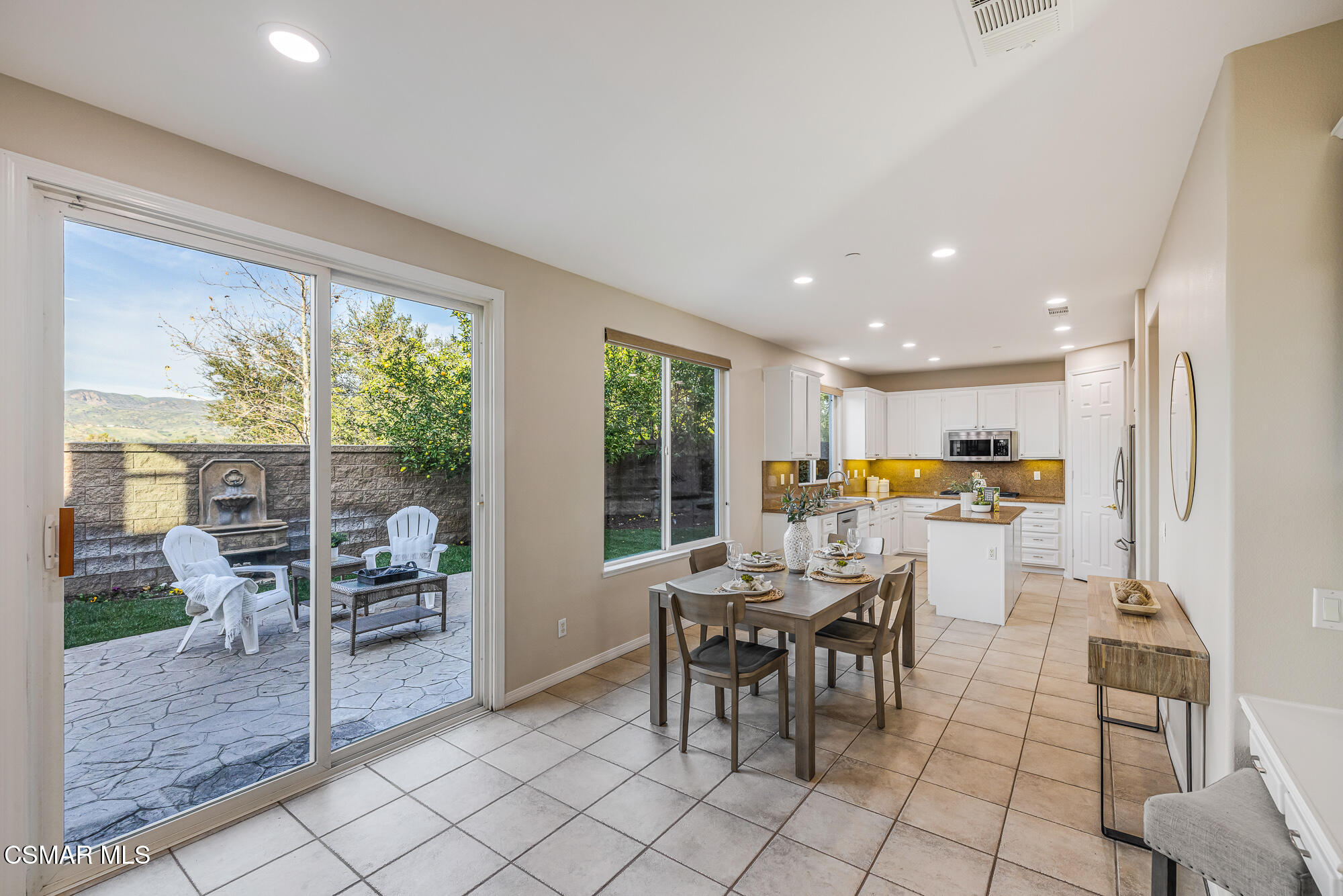 5353 Willow Oak Street Simi Valley, CA 93063 - Photo 9 of 52 a view of a dining room with furniture window and outside view