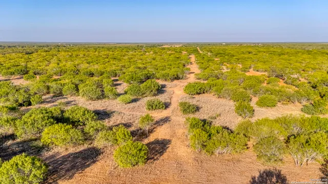 a view of beach and swimming pool