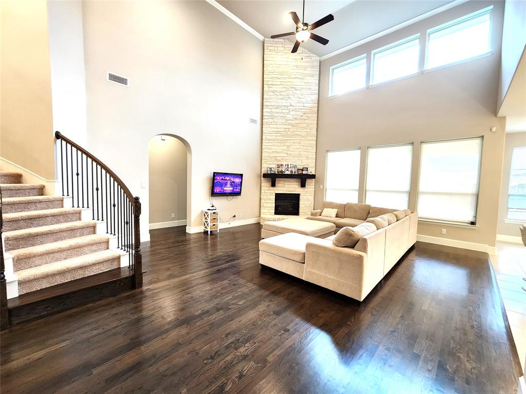 7163 Split Rein Road Frisco, TX 75036 - Photo 20 of 40 a view of living room with furniture and windows