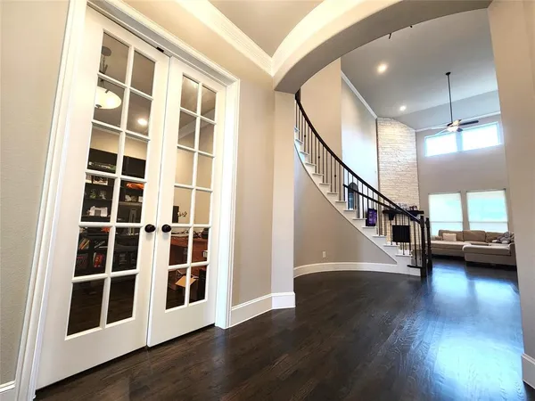 a view of front door with staircase