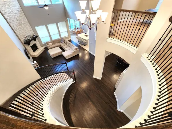 an entryway with wooden floor