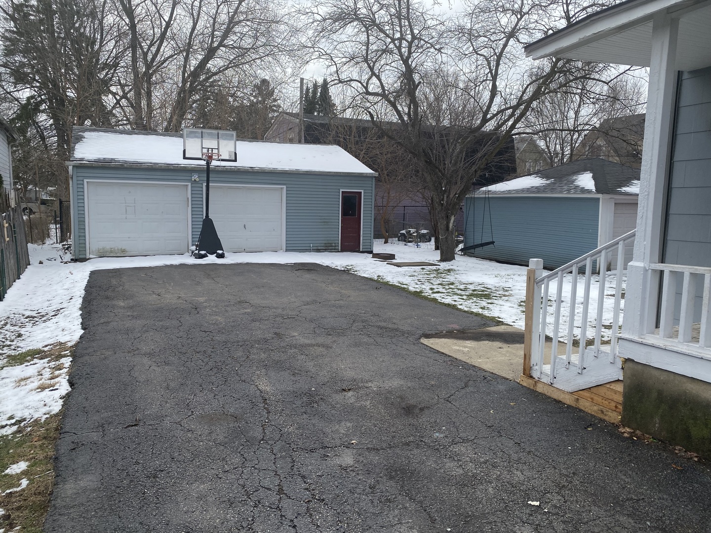 515 Walnut Avenue Elgin, IL 60123 - Photo 2 of 18 a view of a house with backyard and a tree