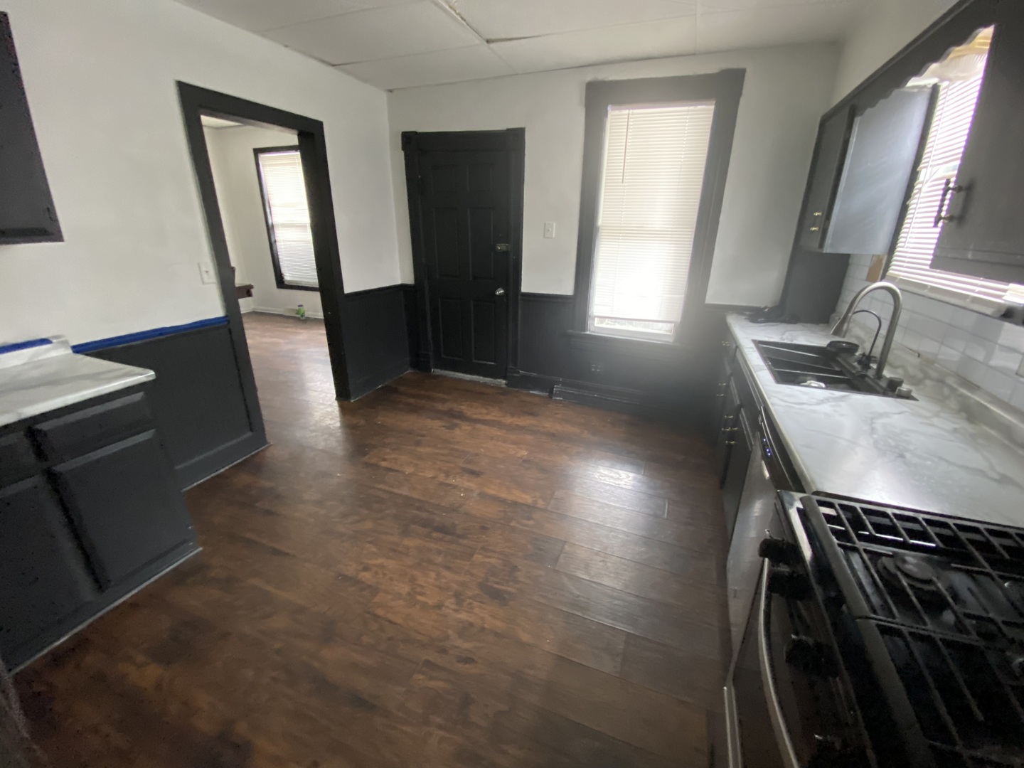 515 Walnut Avenue Elgin, IL 60123 - Photo 8 of 18 a view of a hallway with workspace and mirror