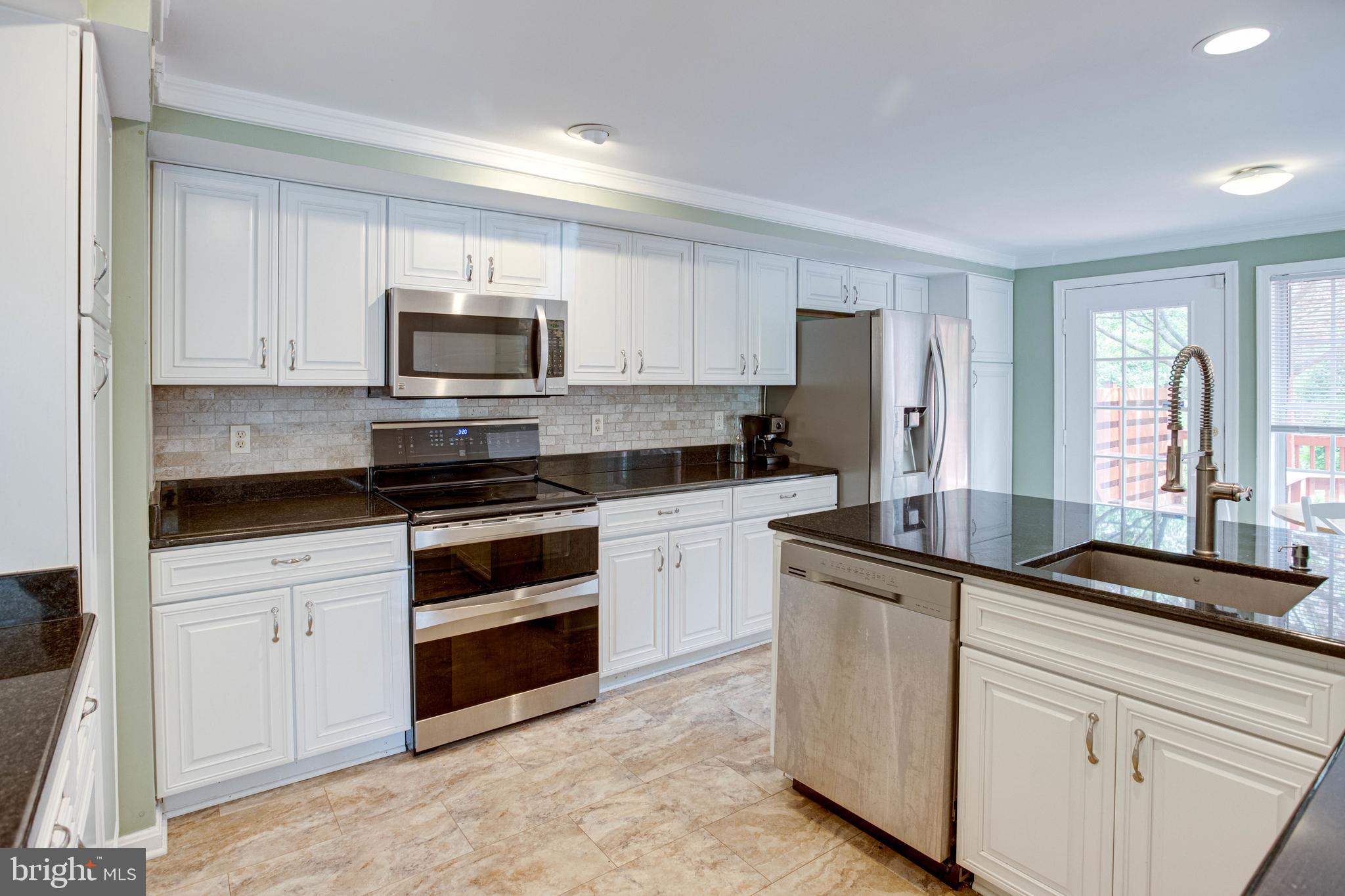 1542 Deer Point Way Reston, VA 20194 - Photo 23 of 68 Kitchen with Luxury Vinyl Flooring