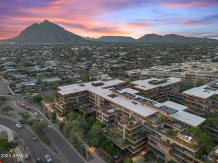 a view of a chairs and table in the patio