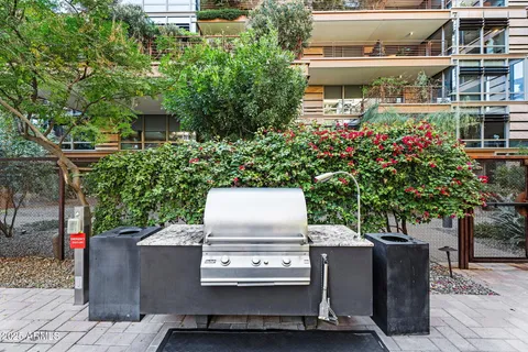 a view of a living room and kitchen