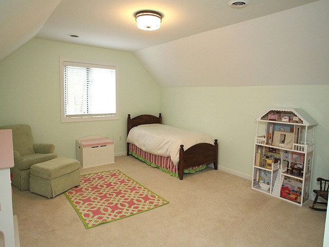2409 Countrywood Road Raleigh, NC 27615 - Photo 14 of 25 Bonus room is currently used as bedroom as basement provides plenty of bonus room space. Bonus Room