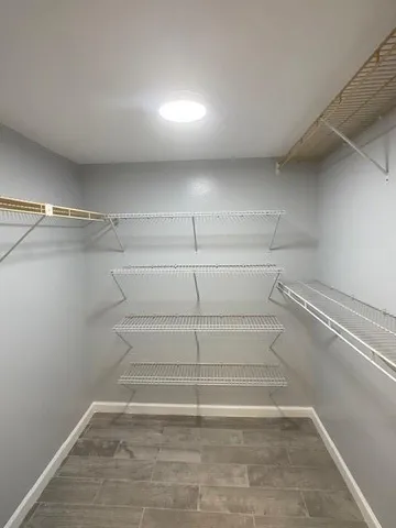 a view of a room with shelves