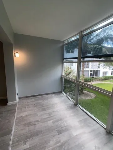 a view of house with swimming pool outdoor seating area and barbeque oven