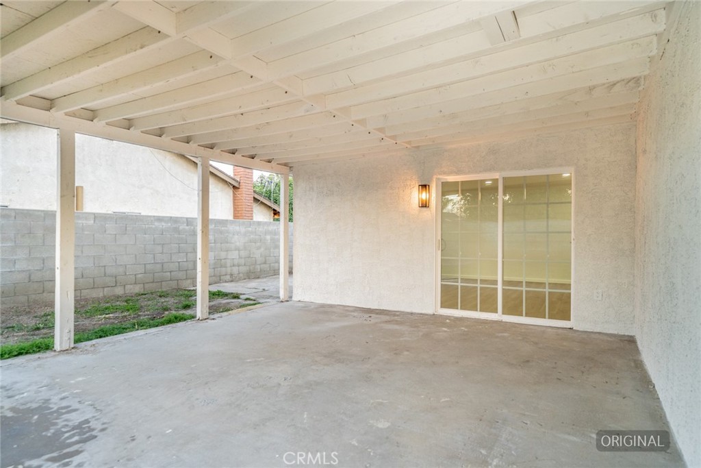 555 North Chestnut Avenue Rialto, CA 92376 - Photo 32 of 33 a view of an empty room with wooden floor and a window