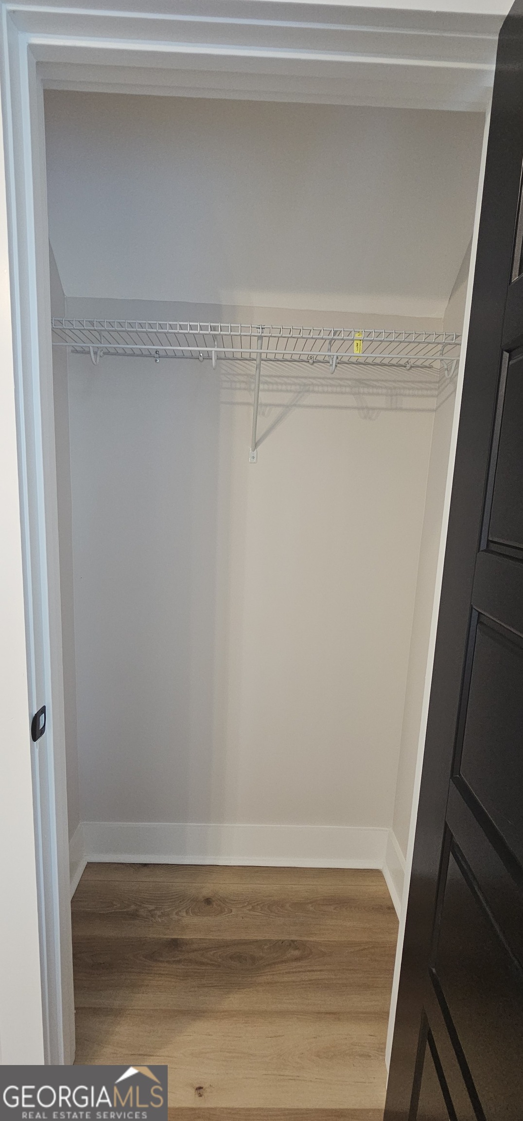 654 Liberty Hill Road Milner, GA 30257 - Photo 107 of 180 a view of small space with racks on the wall