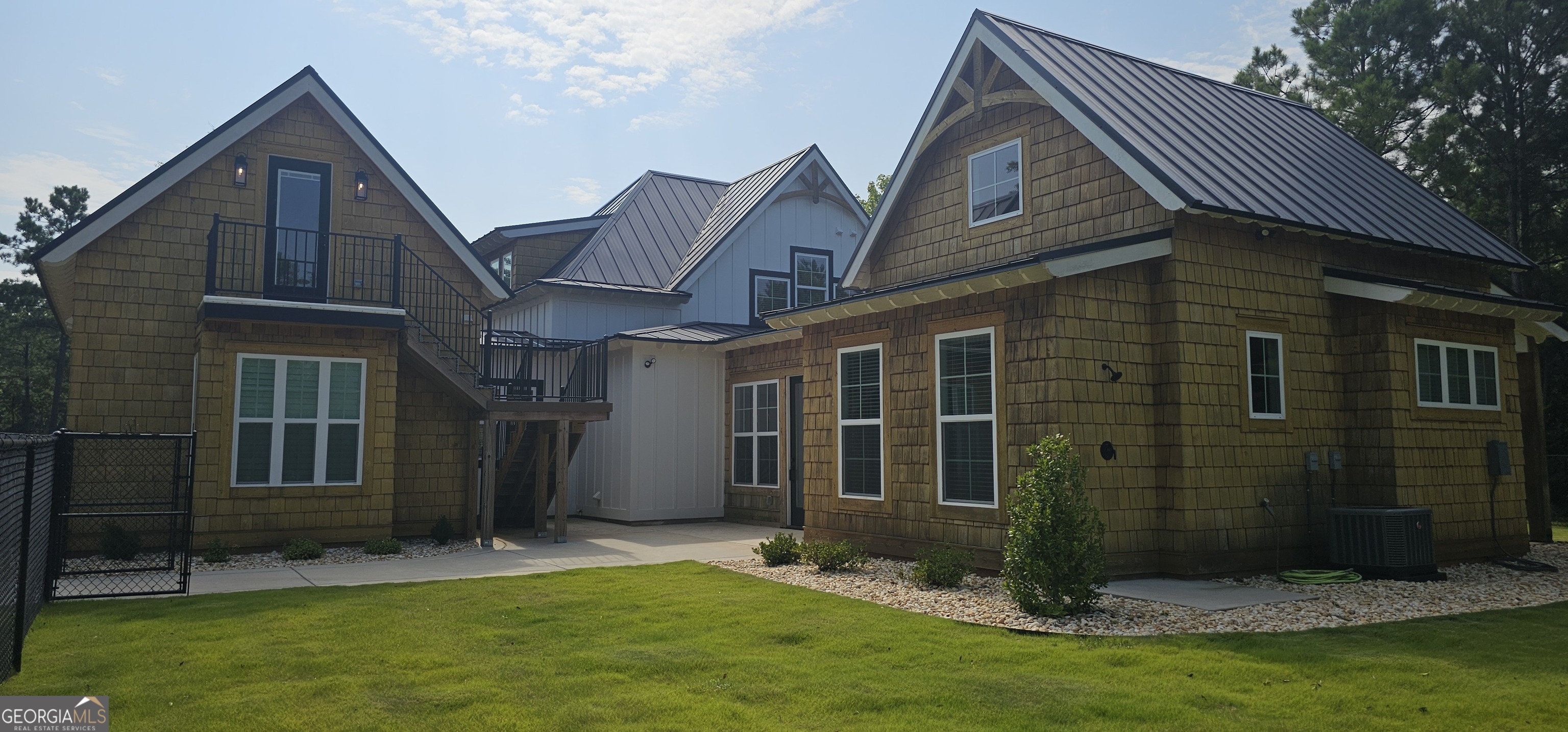 654 Liberty Hill Road Milner, GA 30257 - Photo 11 of 180 a front view of a house with a yard