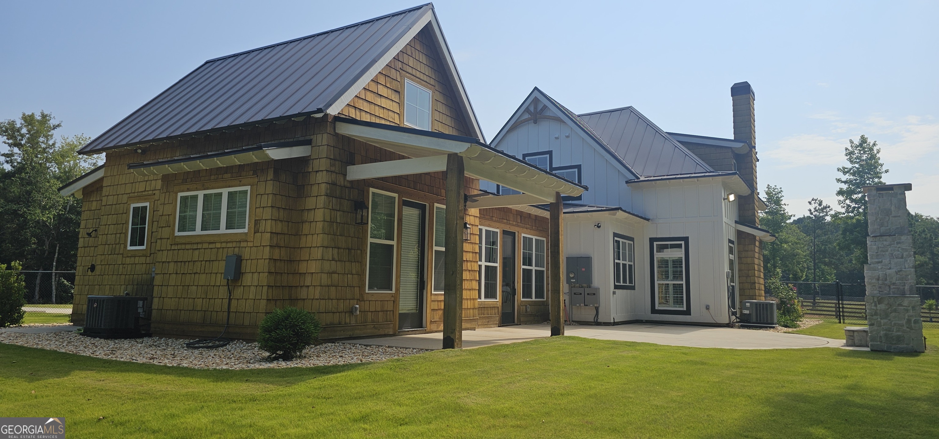 654 Liberty Hill Road Milner, GA 30257 - Photo 13 of 180 a front view of a house with a yard