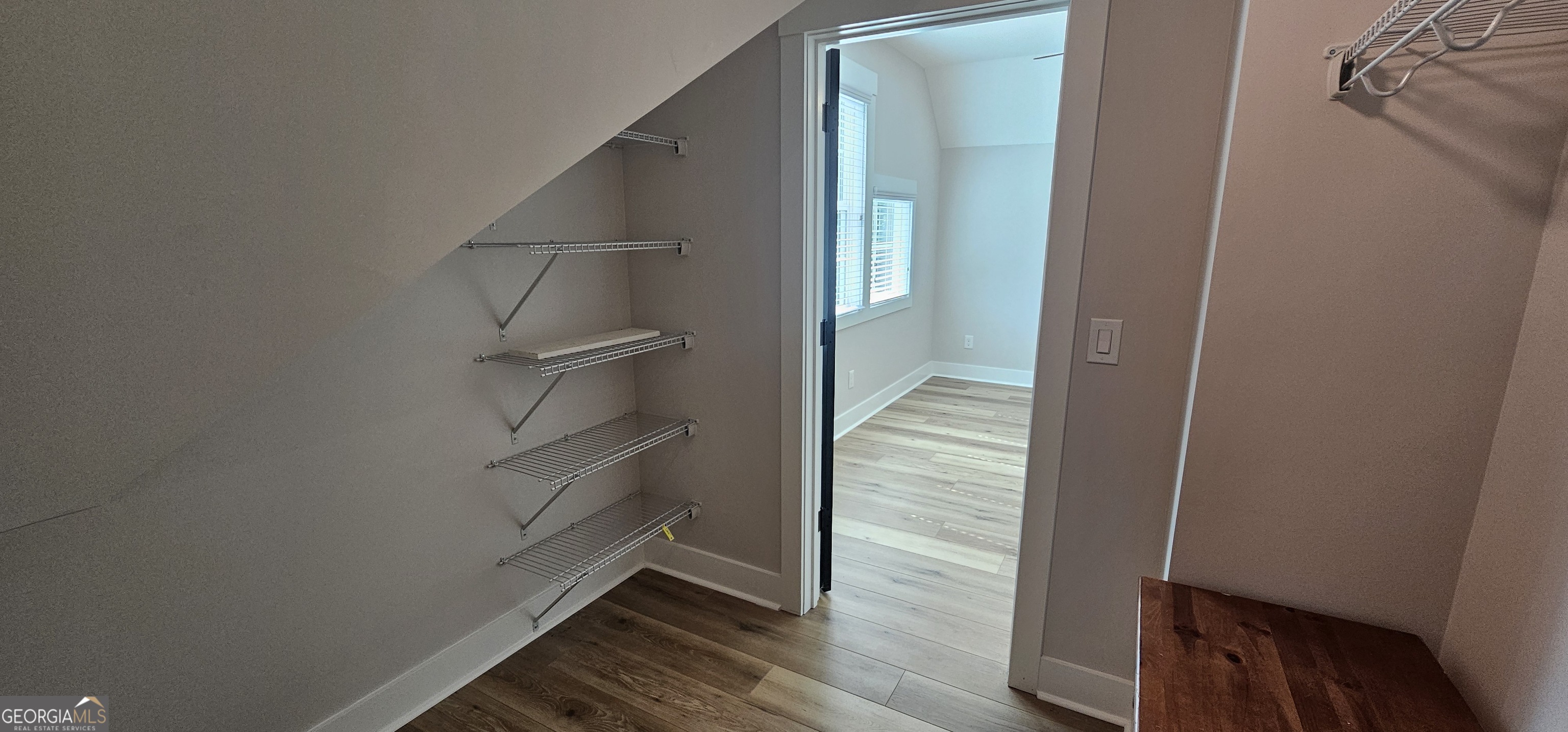 654 Liberty Hill Road Milner, GA 30257 - Photo 133 of 180 a view of a room with rack on the wall