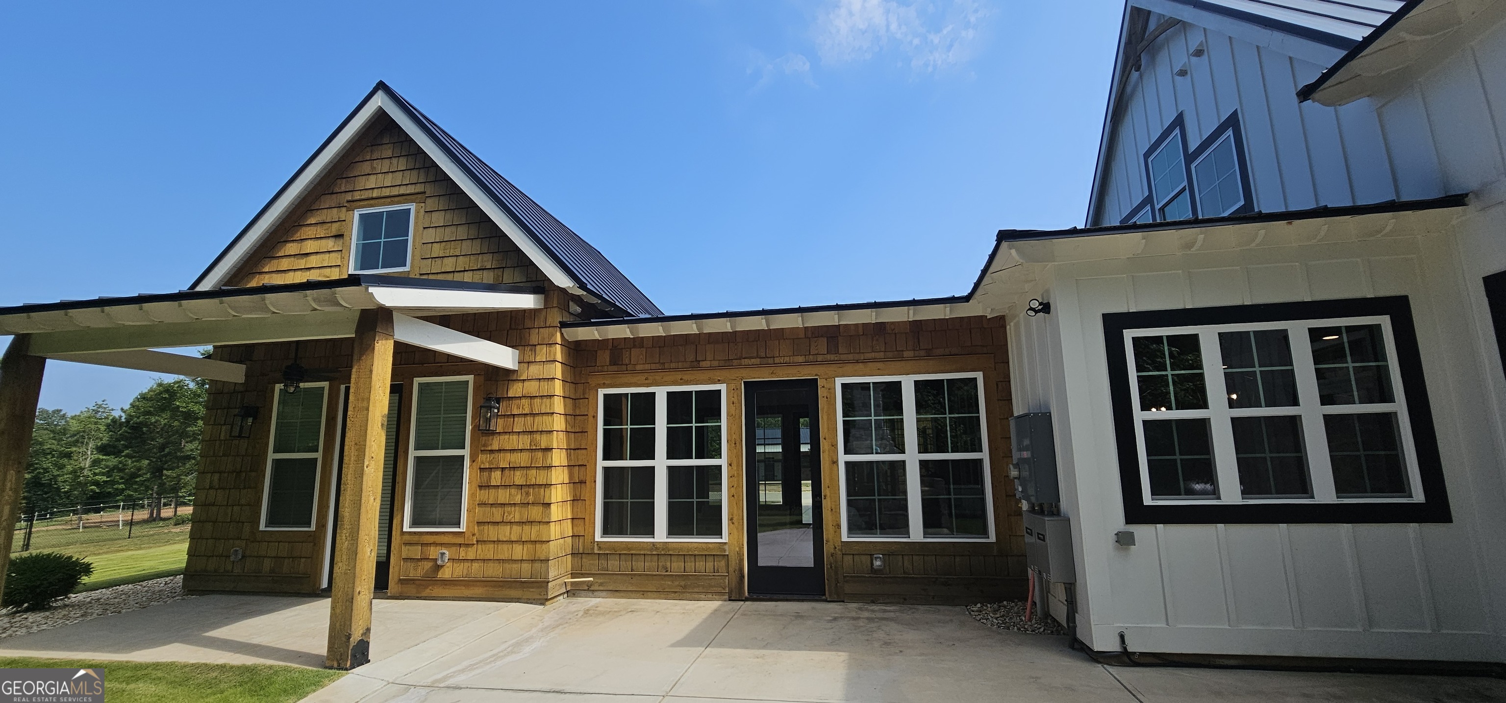 654 Liberty Hill Road Milner, GA 30257 - Photo 14 of 180 a front view of a house with a porch