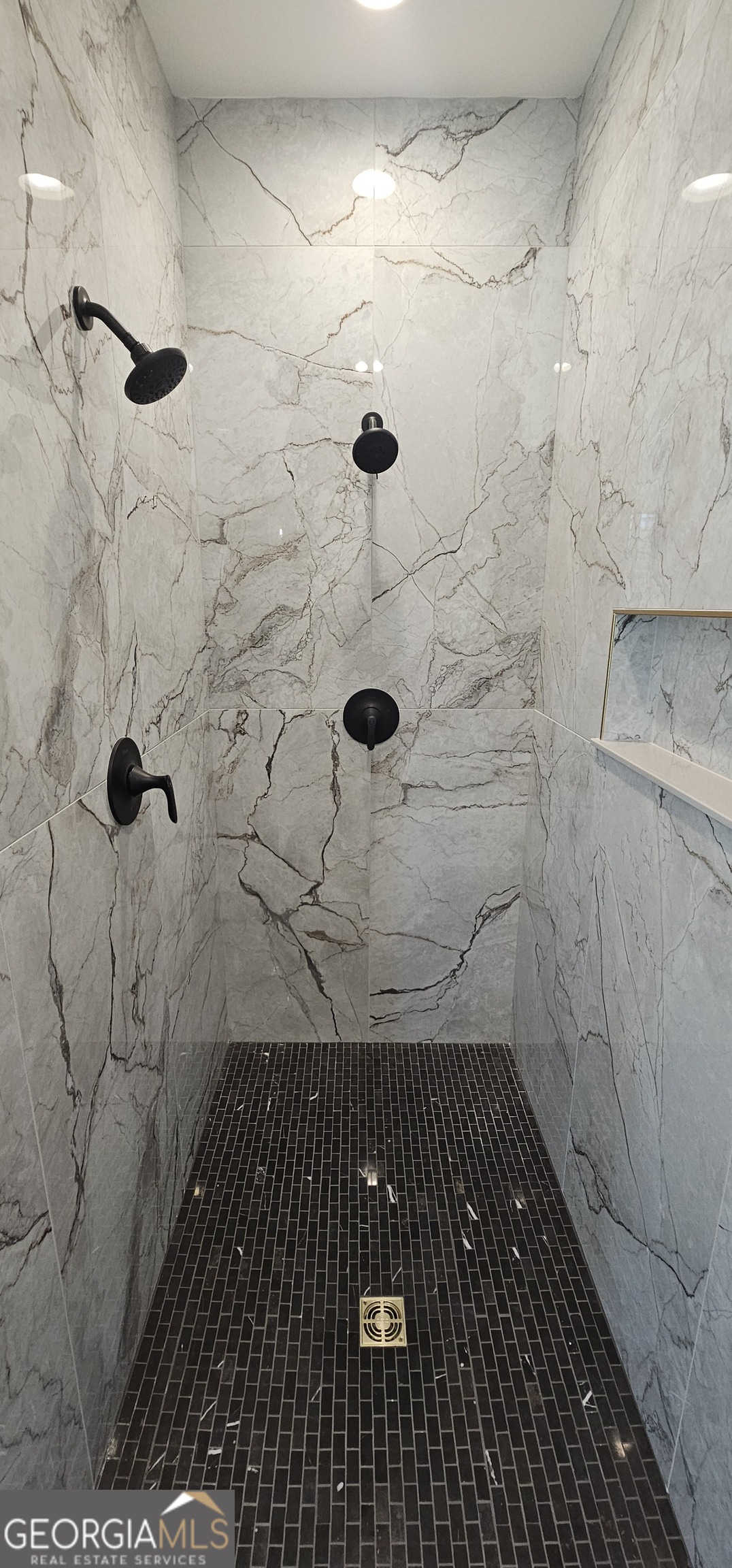 654 Liberty Hill Road Milner, GA 30257 - Photo 158 of 180 a bathroom with a shower