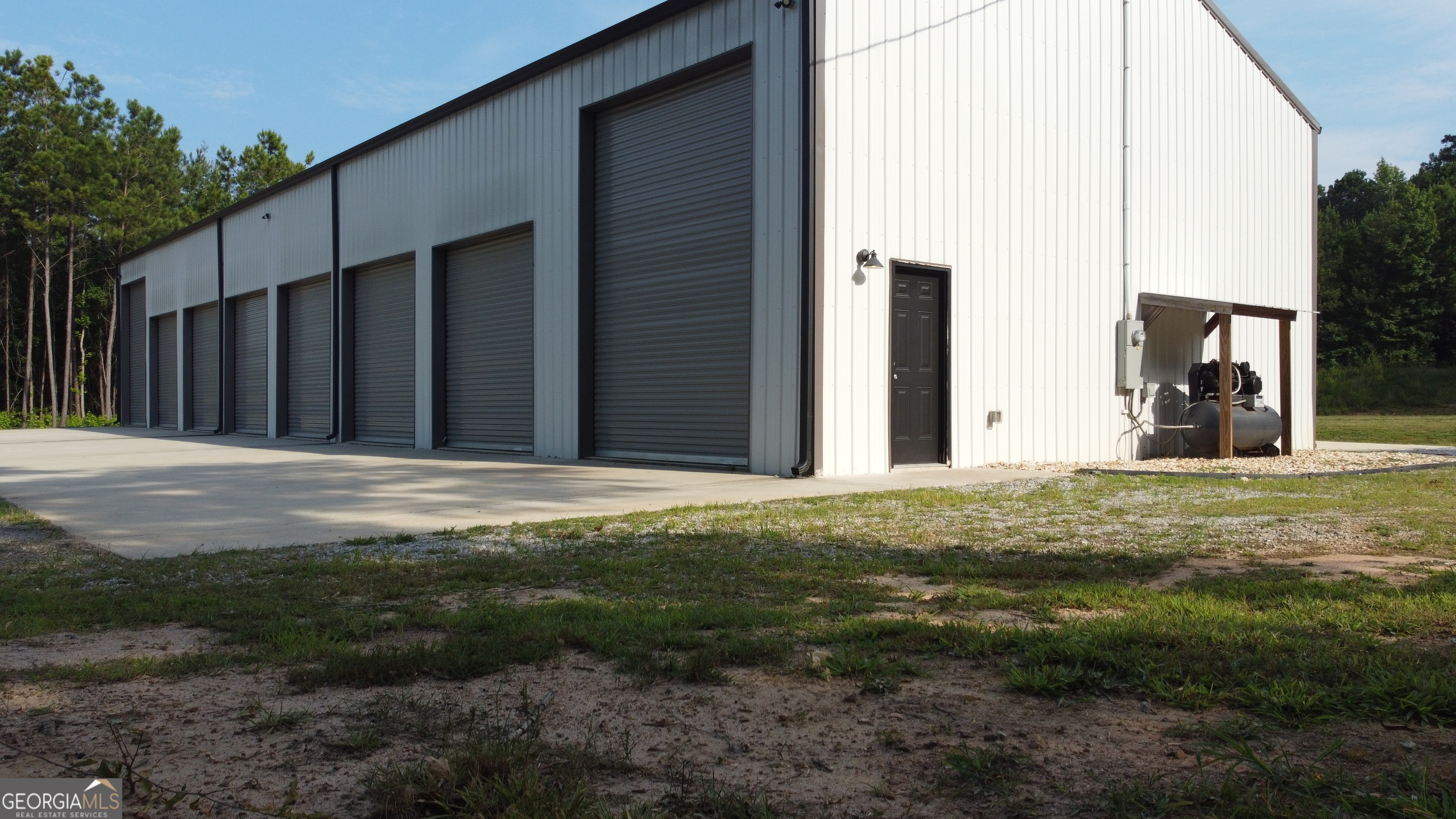 654 Liberty Hill Road Milner, GA 30257 - Photo 175 of 180 a view of a backyard of the house