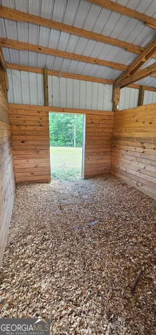 a view of small space with racks on the wall