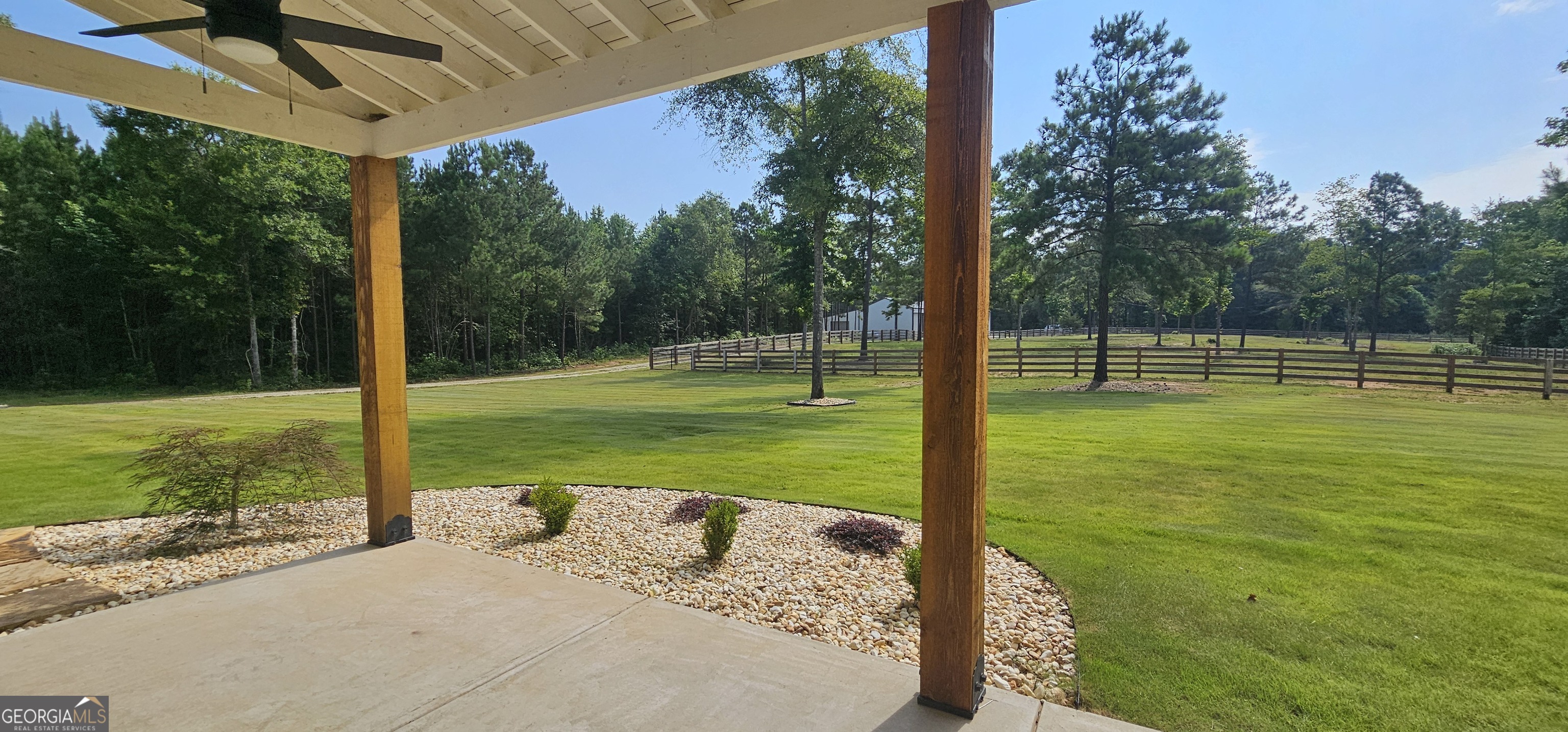 654 Liberty Hill Road Milner, GA 30257 - Photo 5 of 180 a view of a park with a big yard