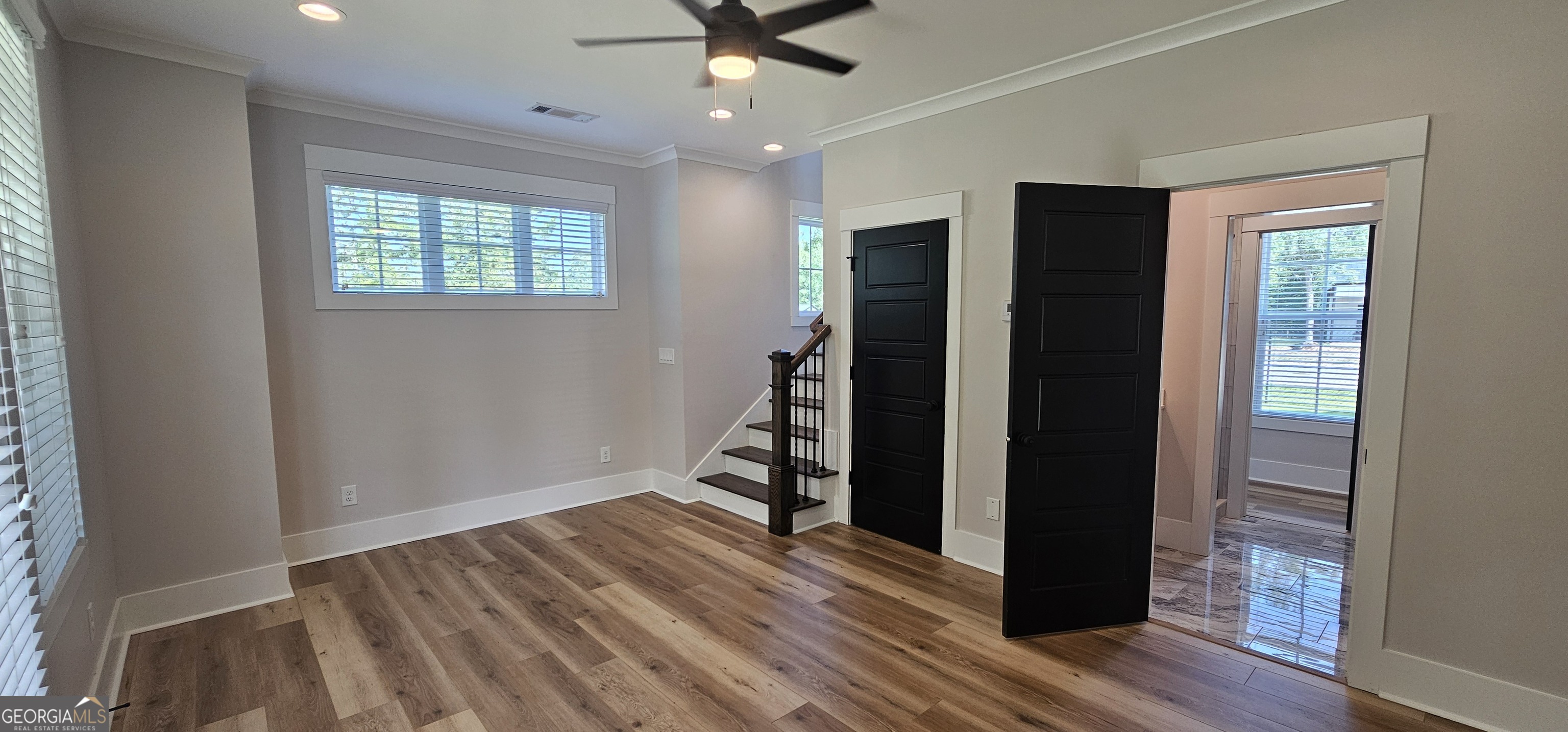 654 Liberty Hill Road Milner, GA 30257 - Photo 60 of 180 wooden floor in an empty room with a window