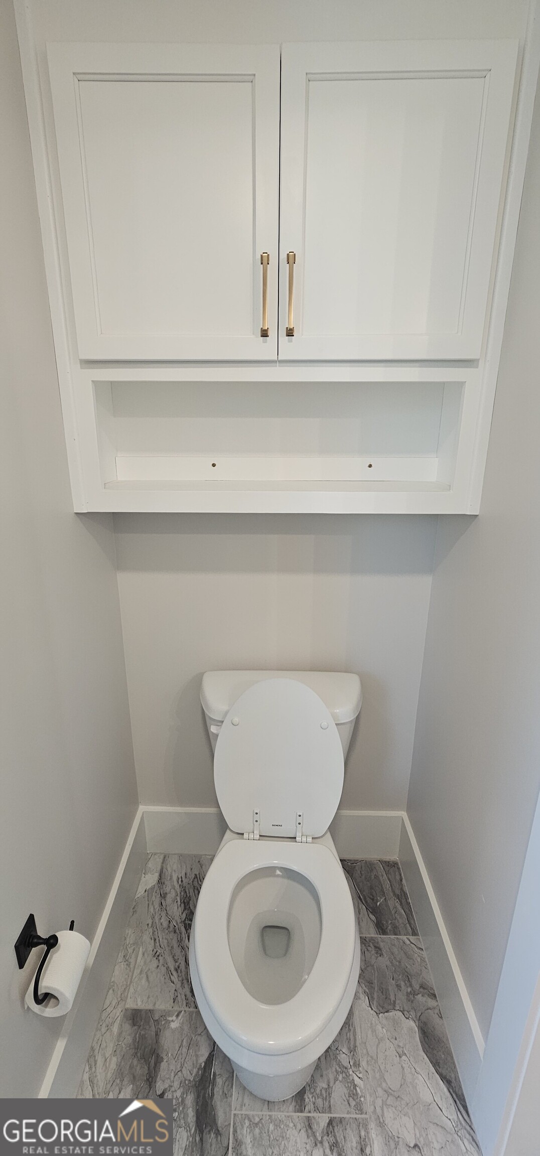654 Liberty Hill Road Milner, GA 30257 - Photo 68 of 180 a close view of a toilet in a bathroom