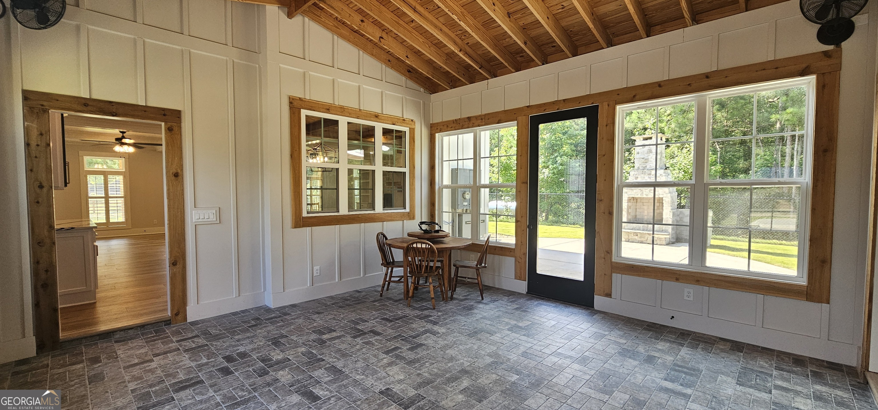 654 Liberty Hill Road Milner, GA 30257 - Photo 77 of 180 a view of an empty room with window and furniture