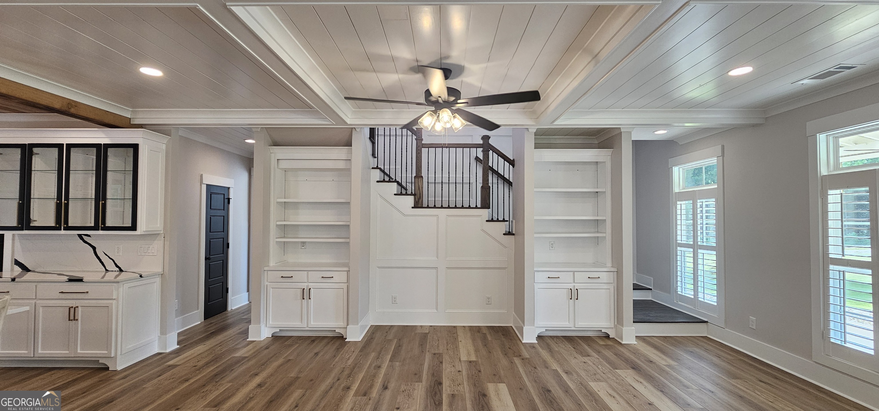 654 Liberty Hill Road Milner, GA 30257 - Photo 94 of 180 a view of a hallway with wooden floor and closet