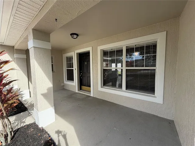 a view of a house with a large window