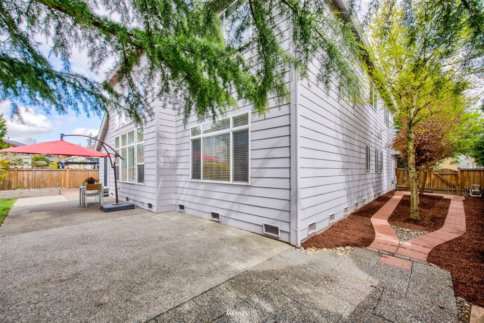 3306 175th Street Southeast Bothell, WA 98012 - Photo 29 of 31 a view of a house with a yard