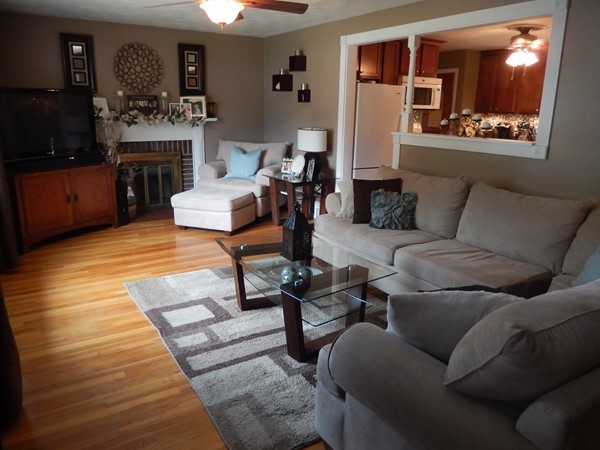 129 Talbot Road Springfield, MA 01119 - Photo 3 of 21 a living room with furniture and a fireplace