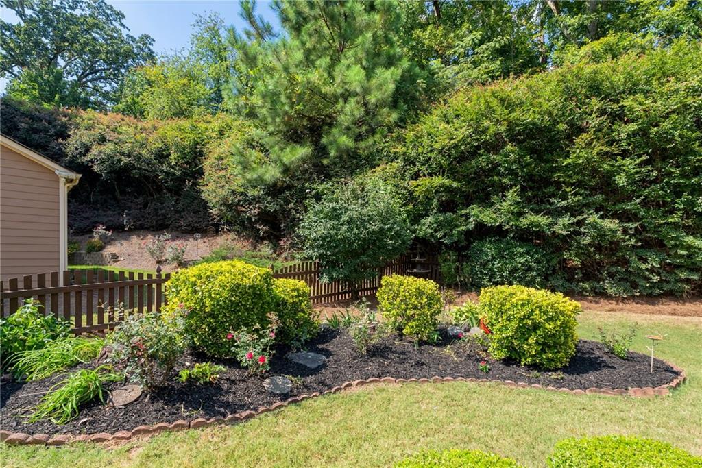 5090 Duke Drive Cumming, GA 30040 - Photo 52 of 65 a view of a garden with plants