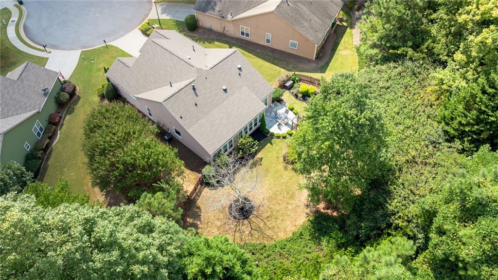 5090 Duke Drive Cumming, GA 30040 - Photo 62 of 65 an aerial view of a house with yard swimming pool and outdoor seating