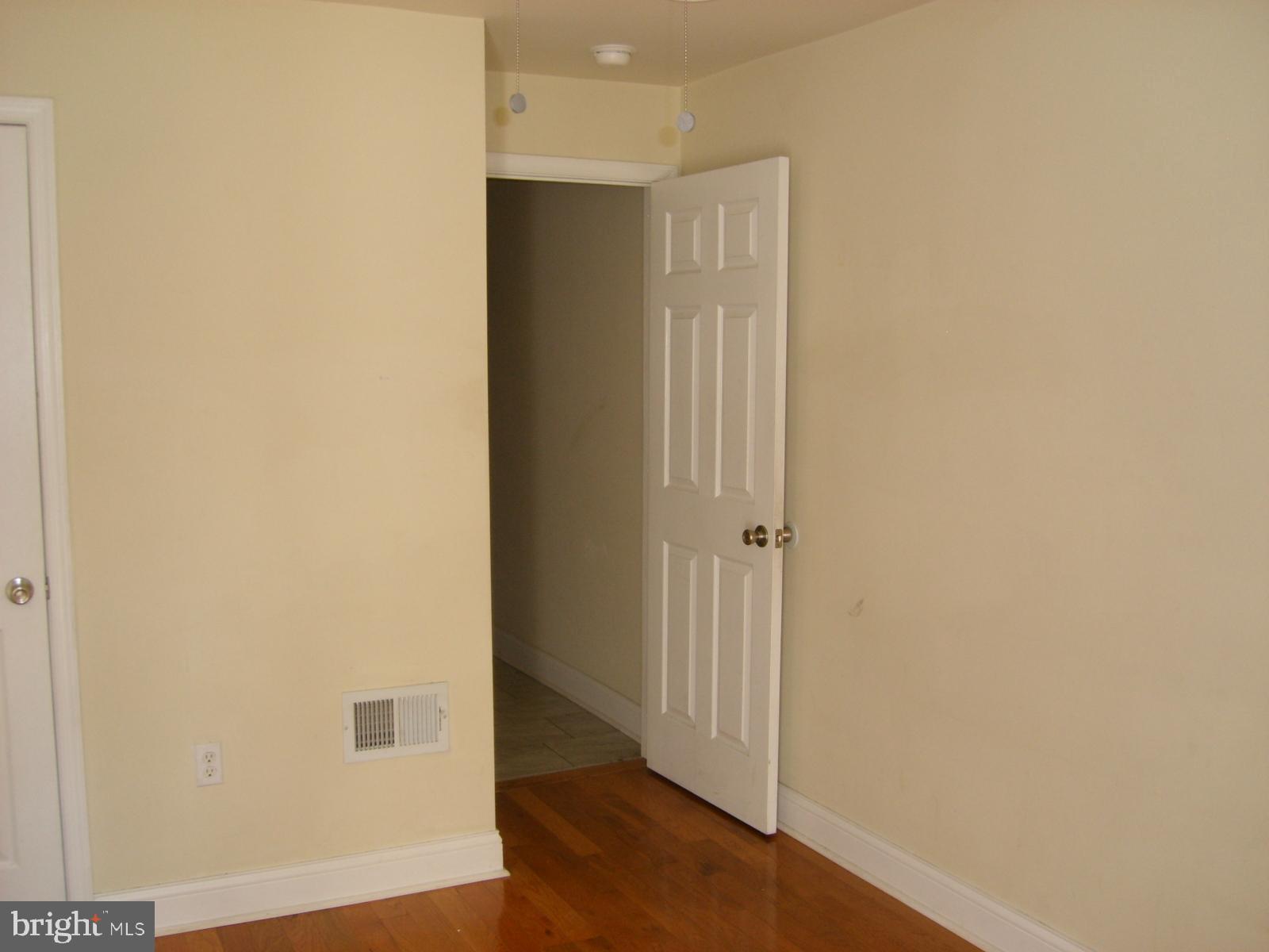 3838 Aspen Street Philadelphia, PA 19104 - Photo 8 of 15 a view of a hallway with wooden floor