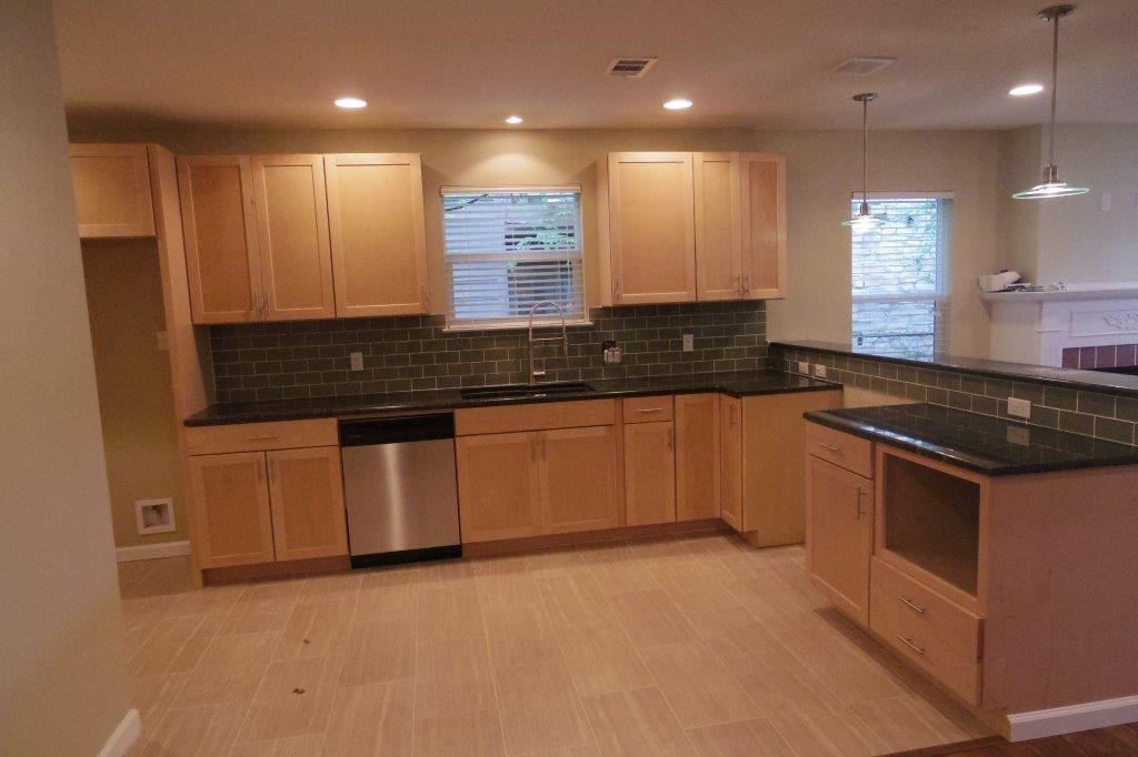 3504 Speedway, Unit A Austin, TX 78705 - Photo 21 of 22 a large kitchen with granite countertop a stove and a sink