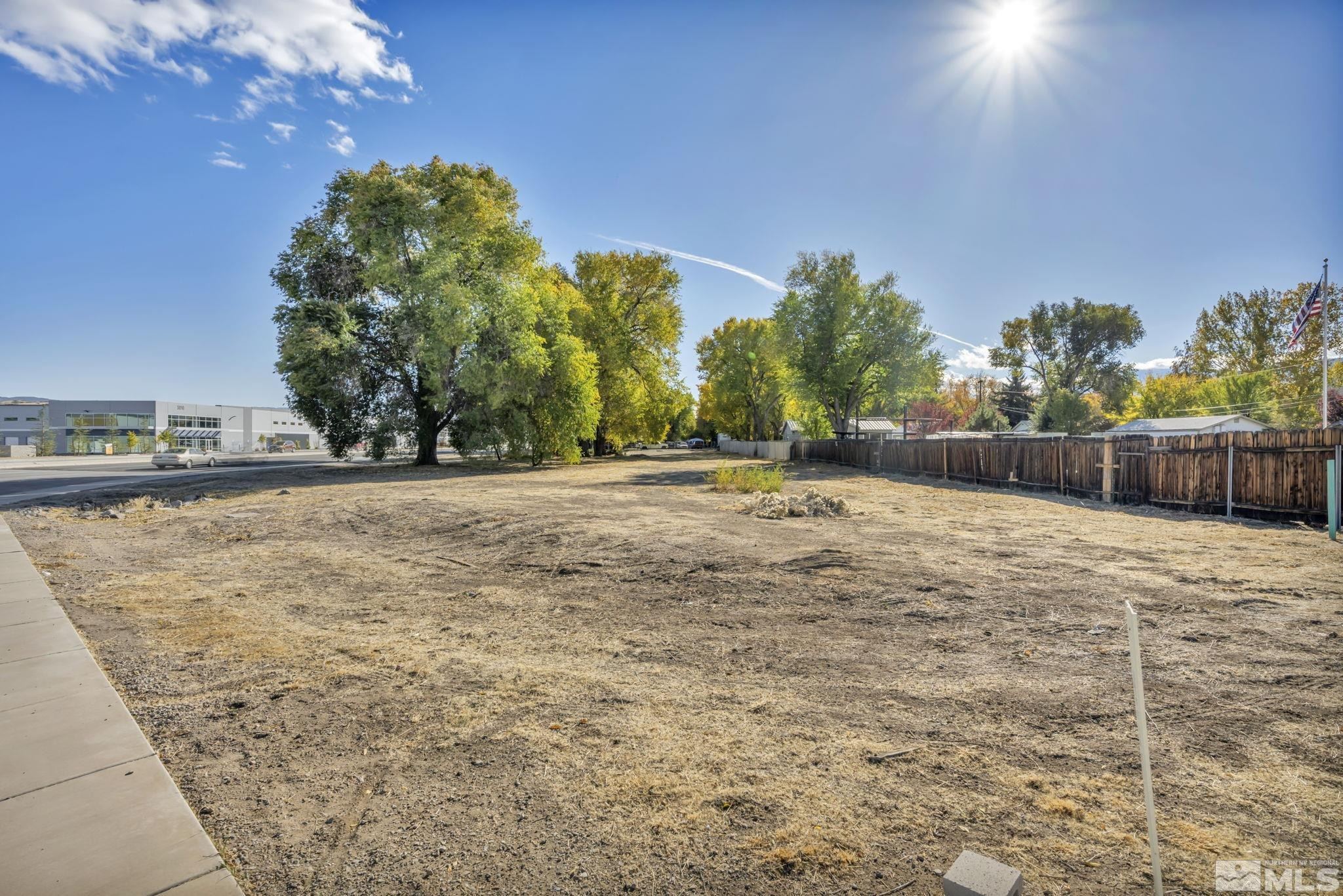 1695 Marvel Way Reno, NV 89502 - Photo 6 of 13 a view of dirt yard with a barn