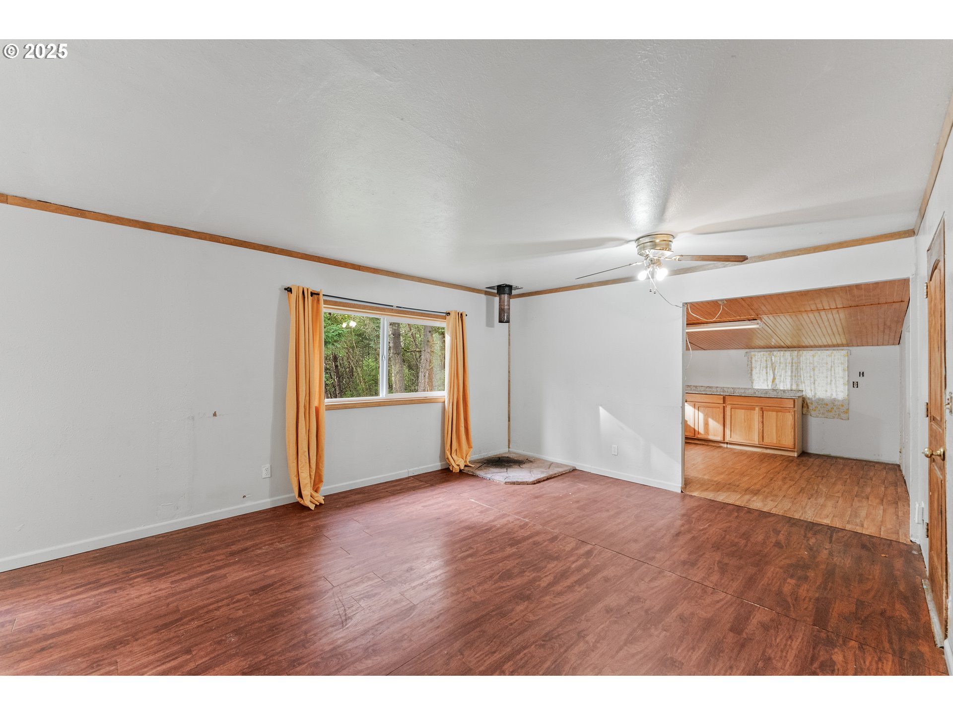 414 Callahan Road Roseburg, OR 97471 - Photo 7 of 33 a view of an empty room with a window