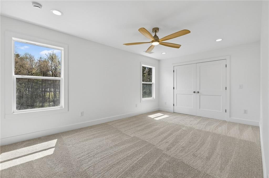 88 Carolyn Path Rockmart, GA 30153 - Photo 37 of 73 wooden floor in an empty room with a window
